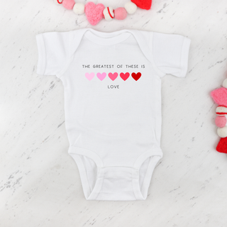 February Onesie of the Month: The Greatest Of These Is Love